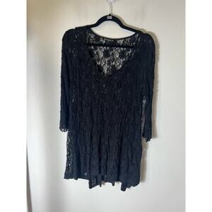 Surrealist black blouse fits like a medium